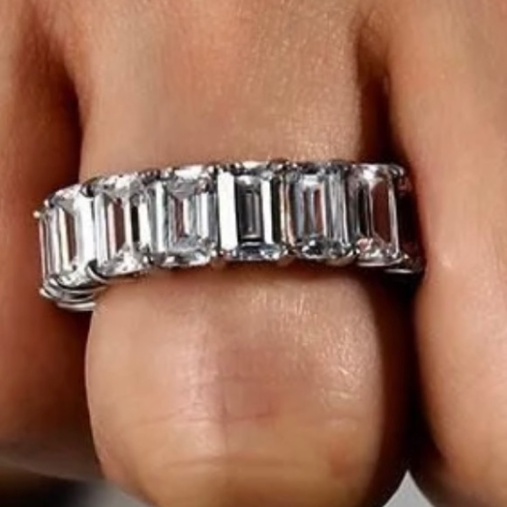 White sapphire emerald cut band. Size 6.